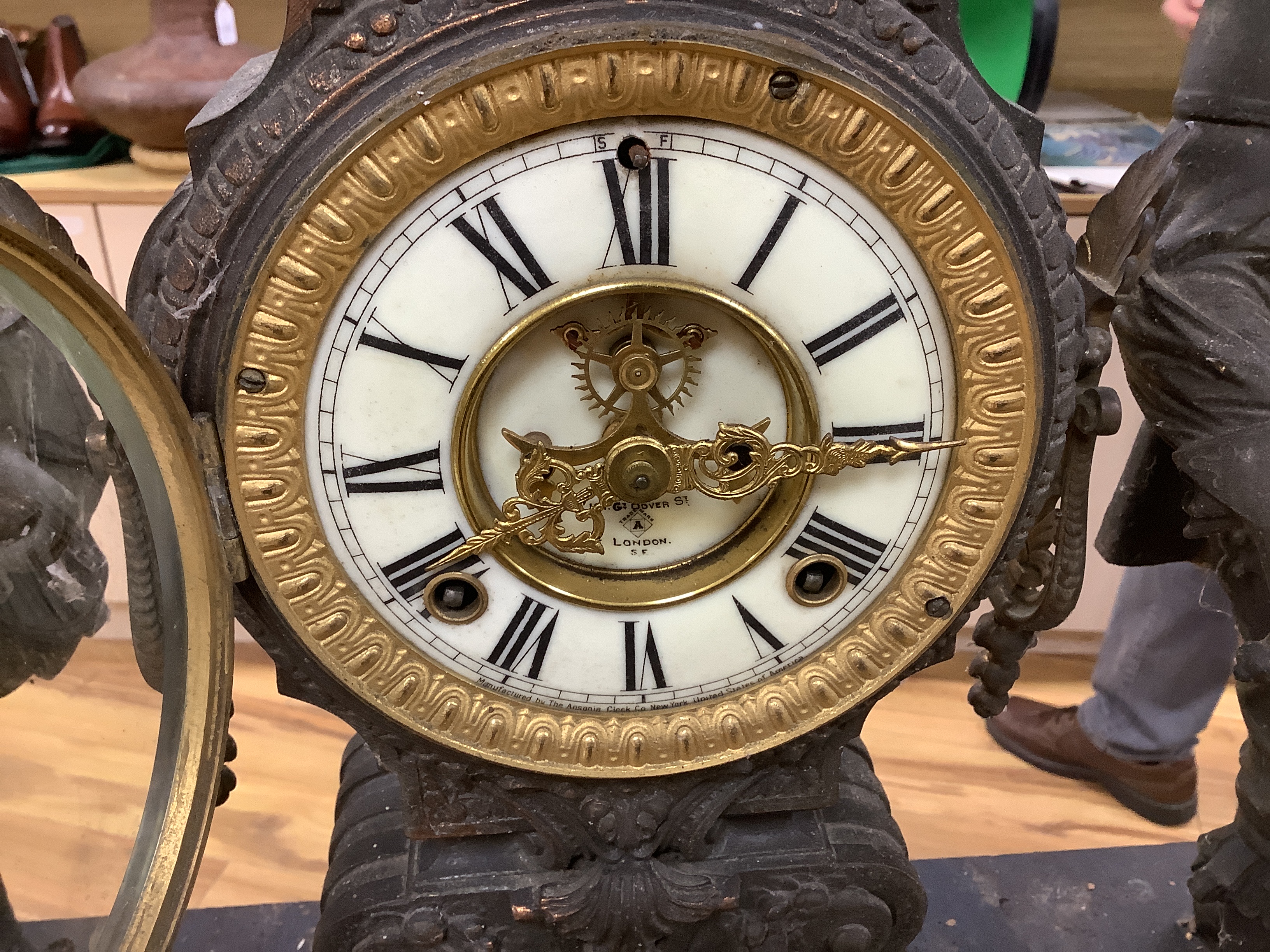 A 20th century American spelter and Cavalier figural mantel clock, 52cm high